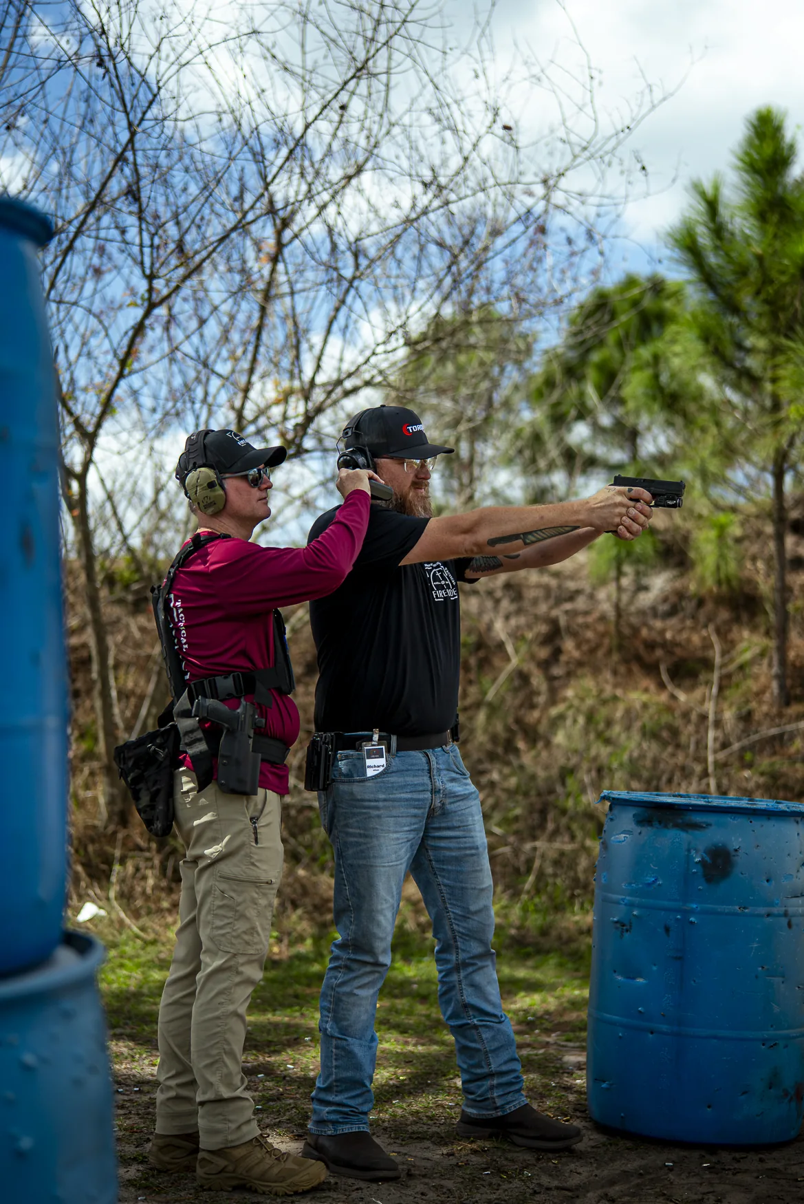 One-on-one pistol coaching at a Fireside event